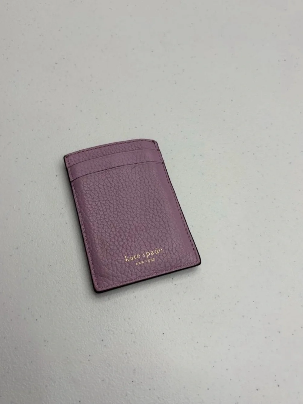 Kate Spade New York lilac leather card holder with textured pebbled finish
